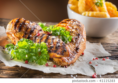 Grill chicken breast salt pepper parsley and herbs 41115283