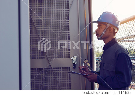 engineer working on checking and maintenance engineer working on checking and maintenance 41115633