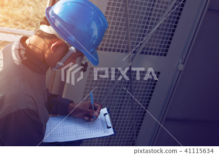 engineer working on checking and maintenance engineer working on checking and maintenance 41115634
