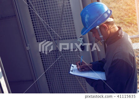 engineer working on checking and maintenance engineer working on checking and maintenance 41115635