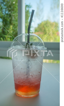 red soda on table 41116600