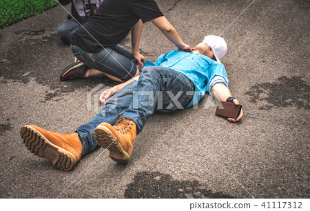 First Aids Emergency CPR on Heart Attack Man 41117312