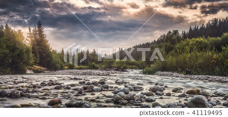 Water Flowing over the Rocks in the River 41119495