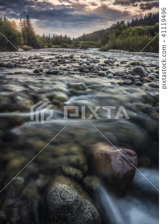 Water Flowing over the Rocks in the River 41119496