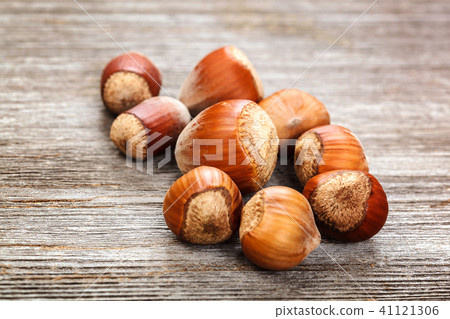 Hazelnut on a wooden background. Healthy food Hazelnut on a wooden background. Healthy food 41121306