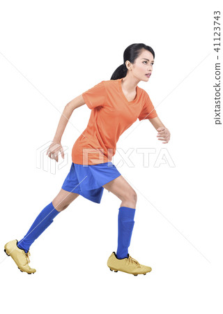 Attractive asian soccer player woman playing soccer Attractive asian soccer player woman playing soccer 41123743