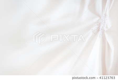 Bride's dress with embroidered elements and beads. 41123763