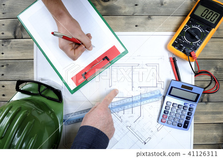 Architect and technician analyze the project  41126311
