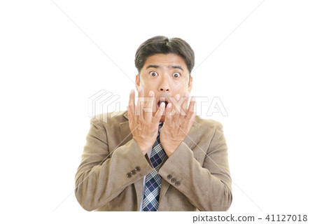 Businessman with a surprised expression 41127018