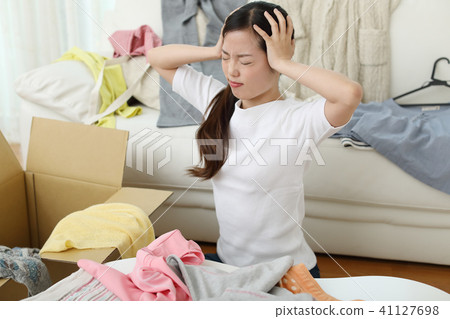 I was in trouble because there were so many clothes. . . 41127698