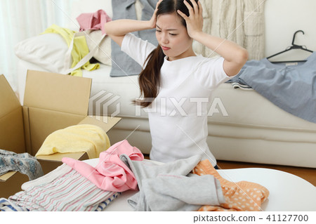 I was in trouble because there were so many clothes. . . 41127700