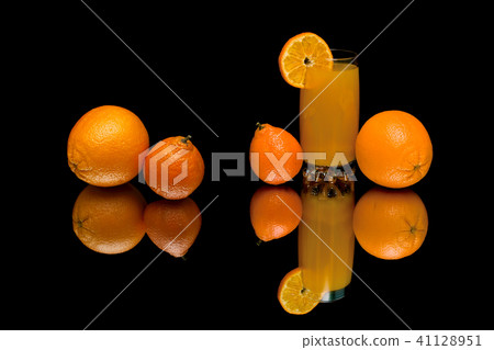 oranges, tangerines and juice on black background oranges, tangerines and juice on black background 41128951