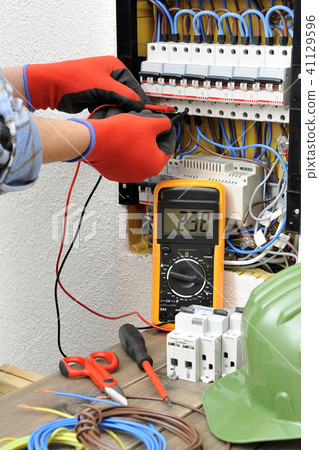 Young electrician technician at work  41129596