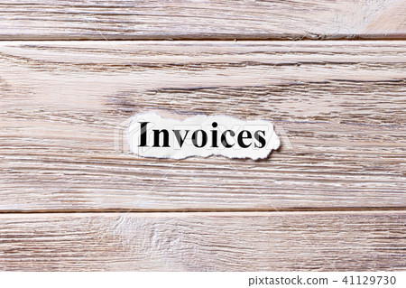 Words of Invoices on a wooden background 41129730