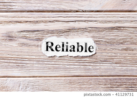 Words of RELIABLE on a wooden background 41129731