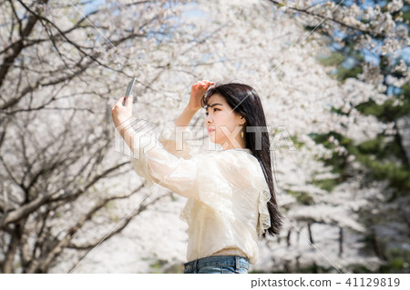 Beautiful flowers and women Beautiful flowers and women 41129819