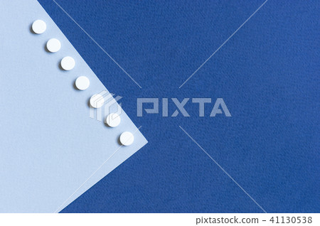Blue background with pills Blue background with pills 41130538