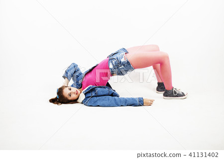young pretty stylish blond hipster girl posing emotional isolate 41131402