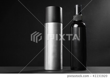 two flacons of hair repairing sprays 41131920