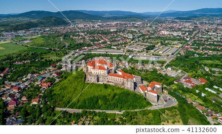 Beautiful panoramic aerial view to Palanok Castle in the city of Mukachevo. 41132600