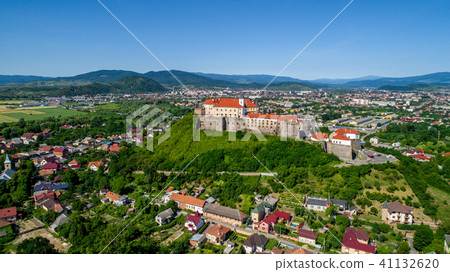 Beautiful panoramic aerial view to Palanok Castle in the city of Mukachevo. 41132620