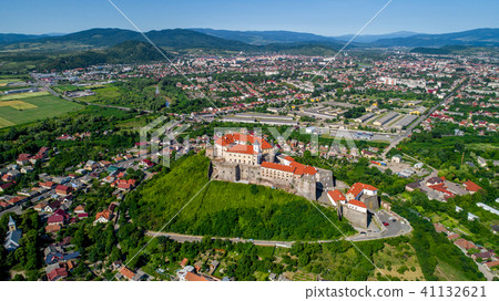 Beautiful panoramic aerial view to Palanok Castle in the city of Mukachevo. 41132621