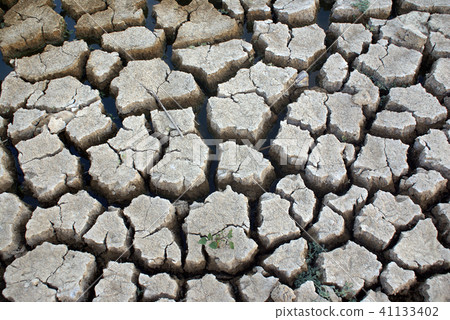 Cracked parched earth Cracked parched earth 41133402