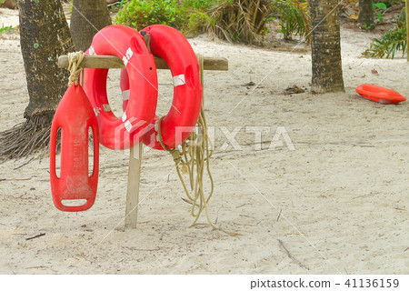 Orange lifesaver on the sandy nice beach 41136159