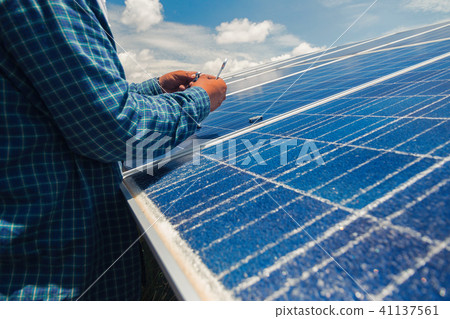 engineer team working on replacement solar panel 41137561