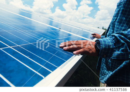 engineer team working on replacement solar panel 41137586