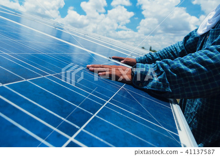 engineer team working on replacement solar panel 41137587