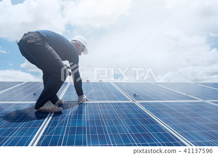 engineer team working on replacement solar panel 41137596