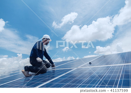 engineer team working on replacement solar panel 41137599
