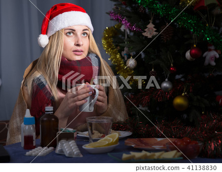 Girl in a plaid is ill of virus in the New Year night 41138830