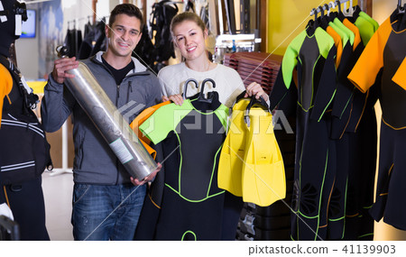 Sporty woman and man are satisfied of costumes 41139903