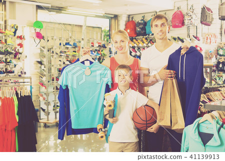 Family picking various clothing 41139913