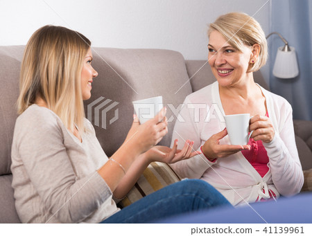 Mom and adult daughter talking Mom and adult daughter talking 41139961