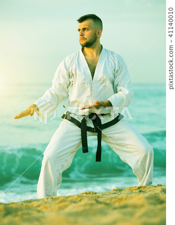 Guy doing karate poses 41140010