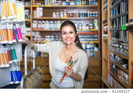 Merry woman choosing various color in tube Merry woman choosing various color in tube 41140327