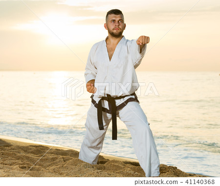 Man doing karate poses Man doing karate poses 41140368