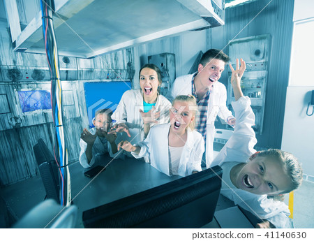 Parents and children depisting madness in quest room Parents and children depisting madness in quest room 41140630