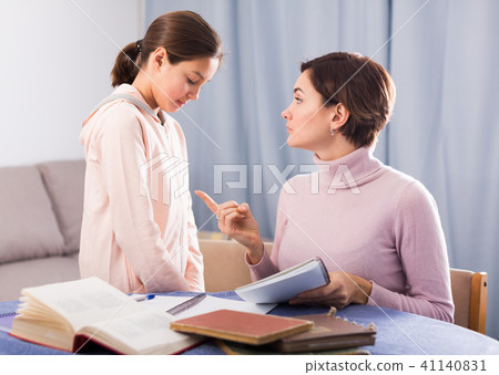 Mother teaches daughter 41140831