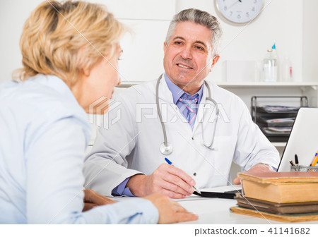 Professor of medicine training colleague 41141682