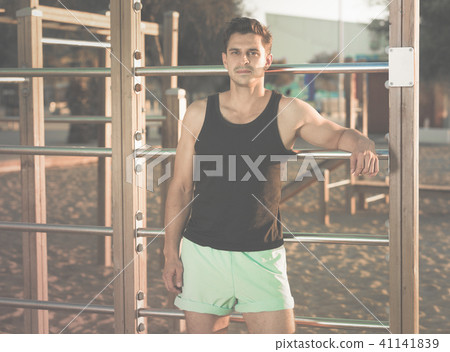 Man taking break during workout outdoor Man taking break during workout outdoor 41141839