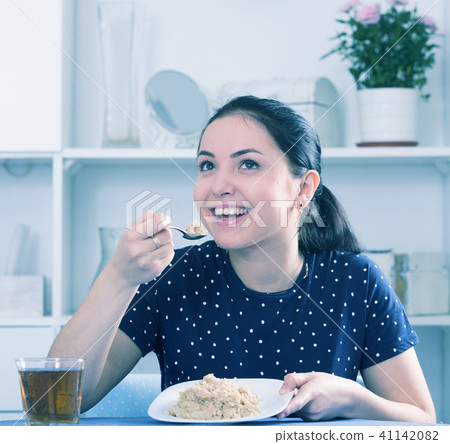 Woman with low calorie breakfast Woman with low calorie breakfast 41142082