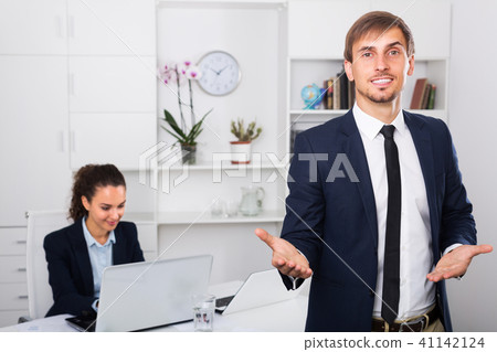 Smiling entrepreneur on working day 41142124