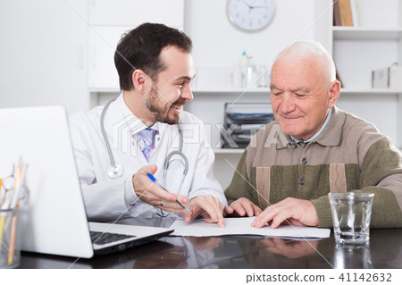 Old man visits doctor Old man visits doctor 41142632