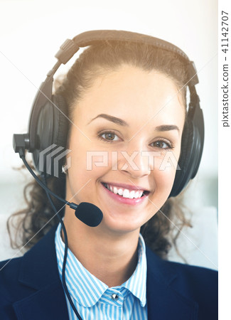 Portrait of pretty woman with headset 41142707