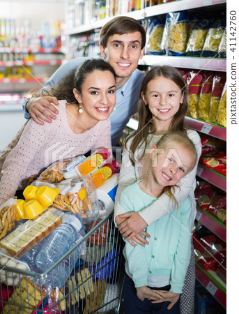 Pleasant customers with children buying food in hypermarket 41142760