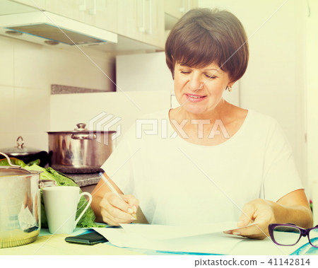 happy woman paying bills happy woman paying bills 41142814